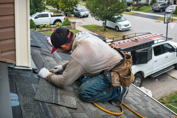 Professional Flat Roof Repair technician working in Grawn, MI